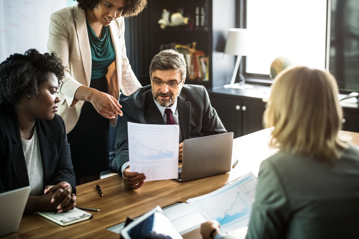 Legal professionals reviewing a case together