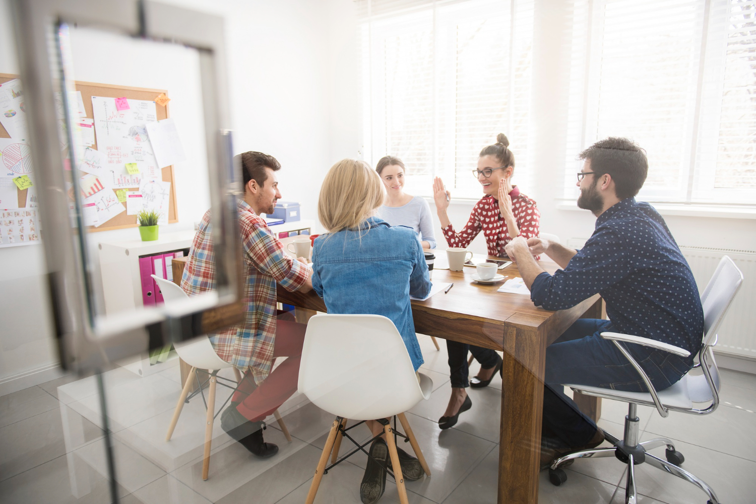 Cogneesol team members collaborating in a meeting